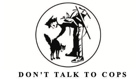 graphic of police officer petting a cat. the cats hair is standing on end and has a face of pure anger. below are the words 'dont talk to cops'